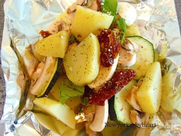 Kartoffelpakker med squash, champignon og soltørrede tomater