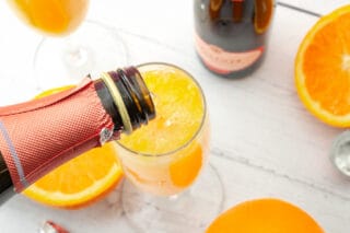 Mimosa drink med champagne og juice