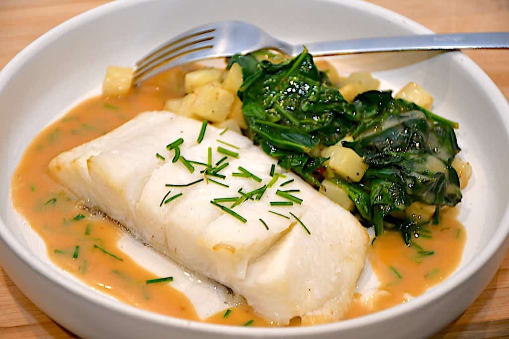 Billede af hellefisk med spinat og knoldselleri.